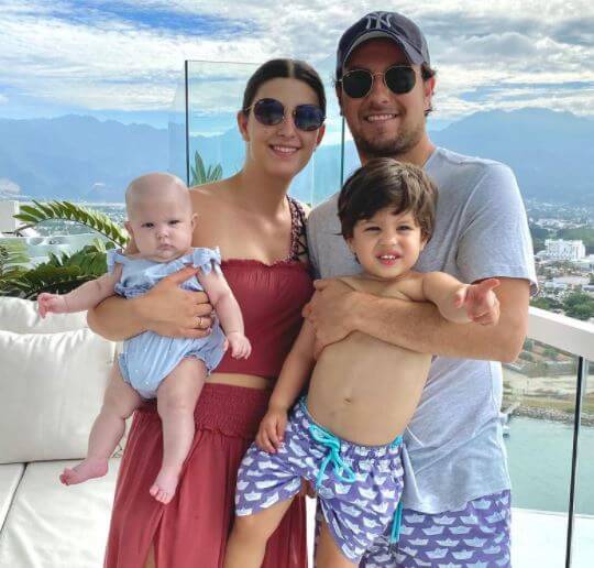 Carola Martinez with her husband, Sergio Perez, and their children.